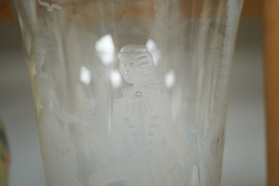 A Venetian engraved glass vase, decorated with views of Venice and a courting gentleman and lady, 31cm high. Condition - good